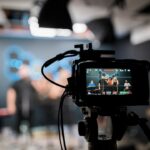 Camera operator filming a live church worship service for livestream